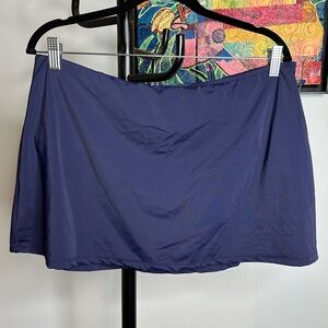 Athleta Tidal Swim skirt. Never worn. In blue. Size XL.